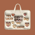 Inflatable grey laptop bag with a cute panda design, showing the inflation valve and back strap for attaching to suitcase handle.