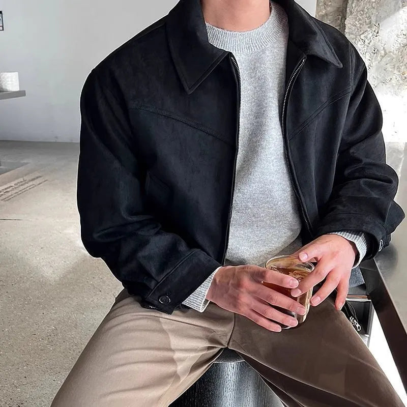Short jacket with loose lapels in brown suede-style fabric, front view, on a plain background.