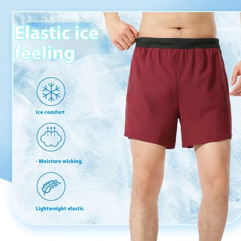 Men's solid colour polyester basketball shorts with low waist design on a neutral background.