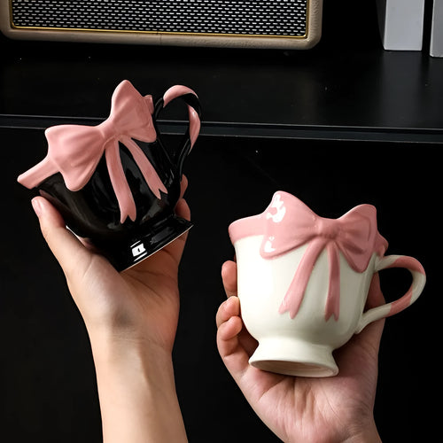 Ceramic mug with girl heart bow design in black pink colour