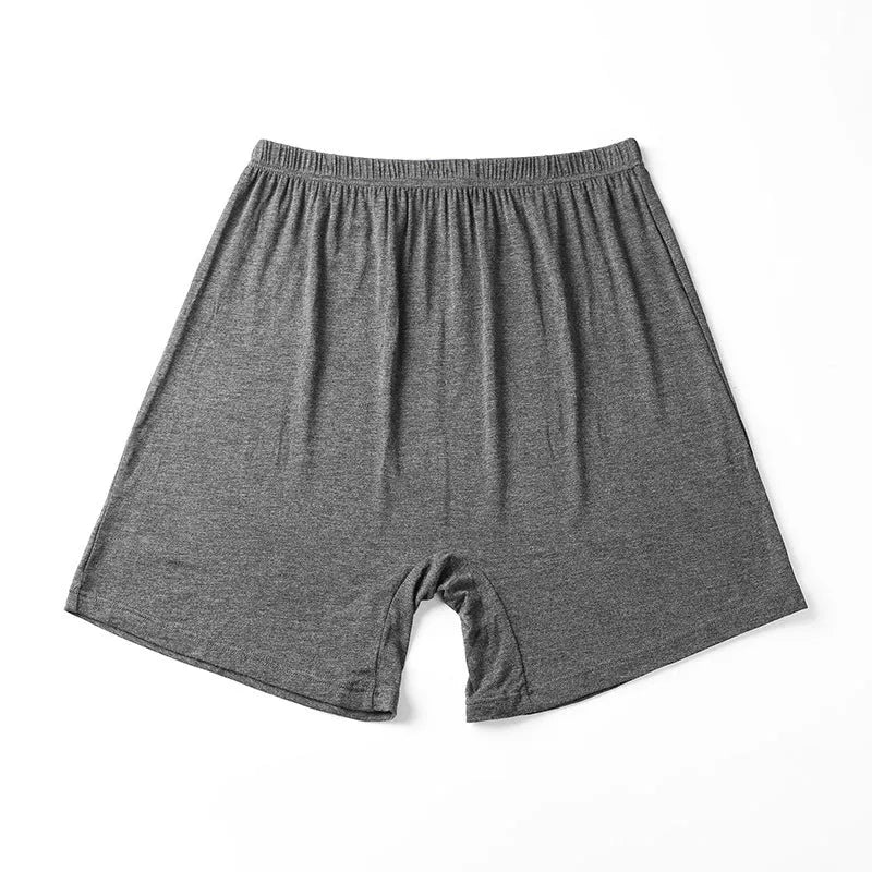 Solid colour high-waist men's modal boxers in black, brown, grey, and blue on a white background