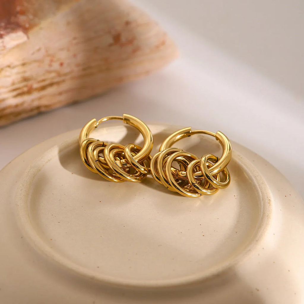 Gold tone stainless steel earrings with electroplated finish in unisex ins style design
