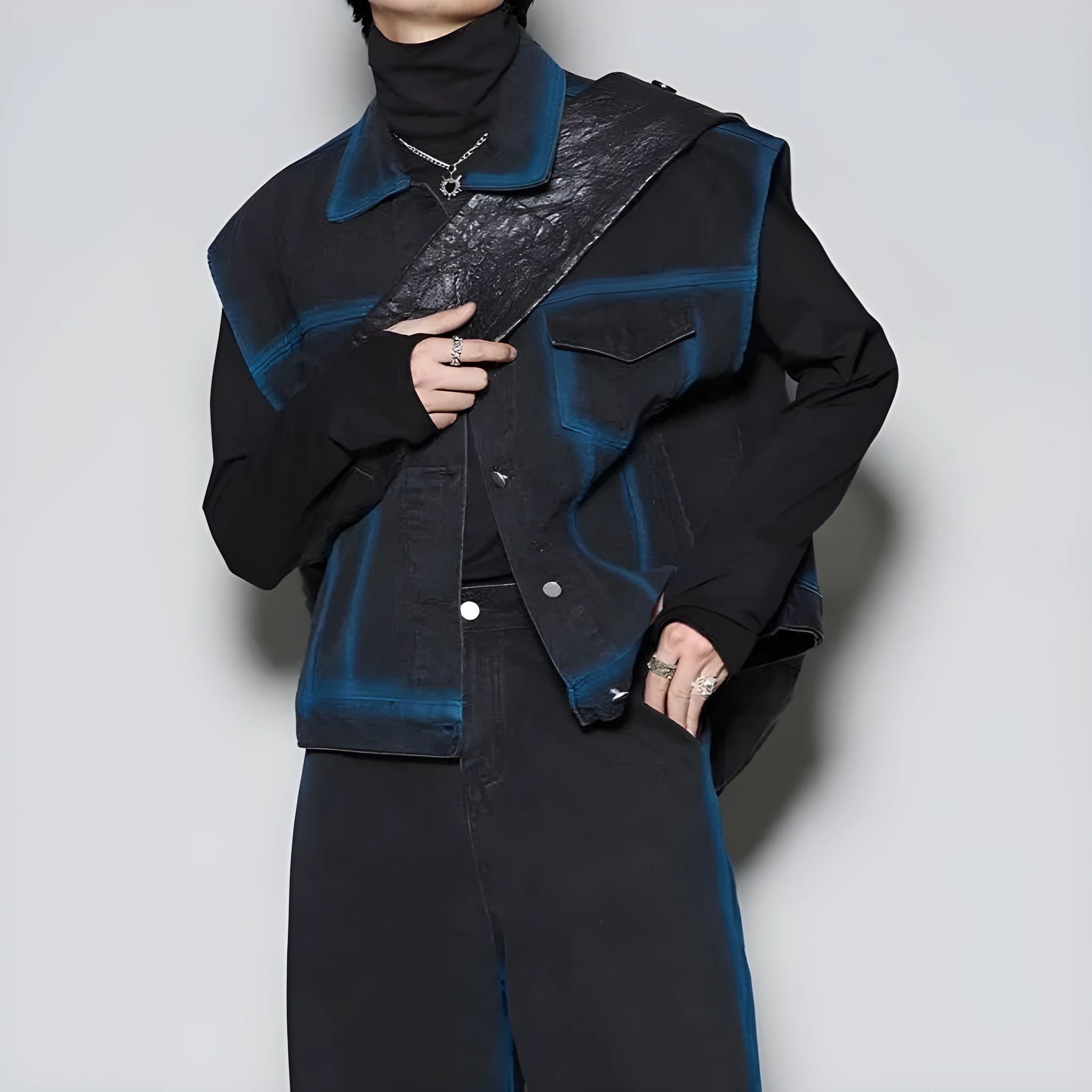 Blue distressed fleece-lined vest and jeans two-piece suit set on a model