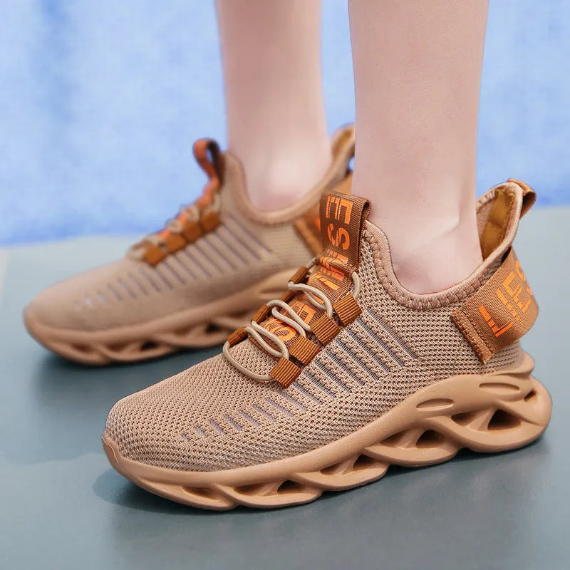 Children's coconut design sneakers with Velcro strap in black, khaki, or white.