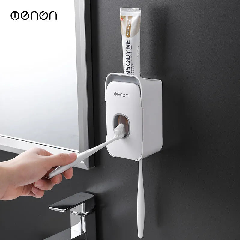 Automatic toothpaste dispenser in blue colour made from ABS plastic with a wall-mount design.