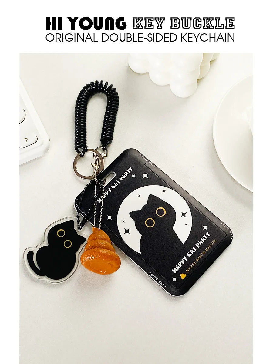 Plastic card holder with cartoon black cat design and a metal ferrule pendant attached.
