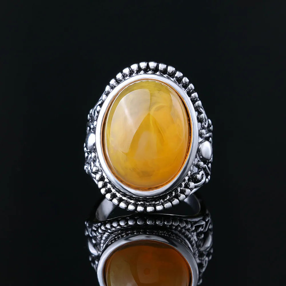 Geometric retro ring with fluorescent beeswax detailing on antique silver electroplated alloy