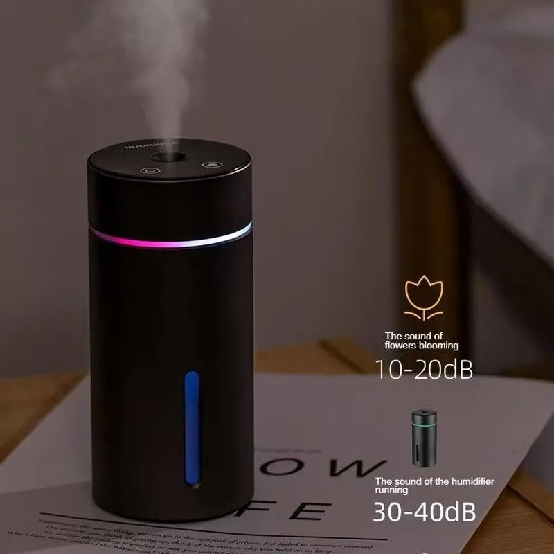 Aluminium car and desktop humidifier diffuser with 260ml tank and colourful LED light on black background.