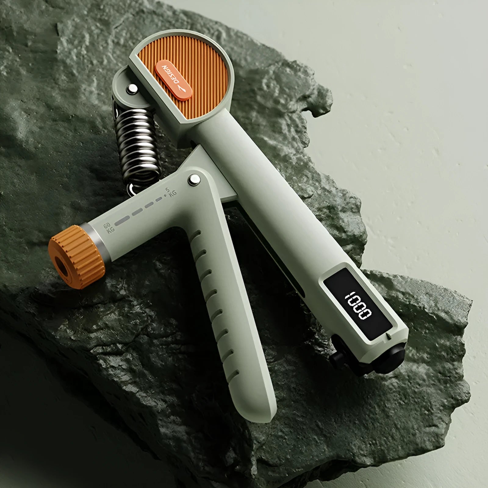 Adjustable hand grip strengthener in black, made from ABS plastic for fitness training.