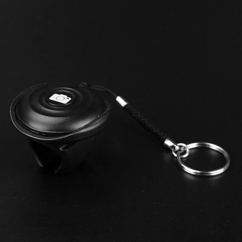 Black Bluetooth selfie remote control for wireless smartphone and camera photography