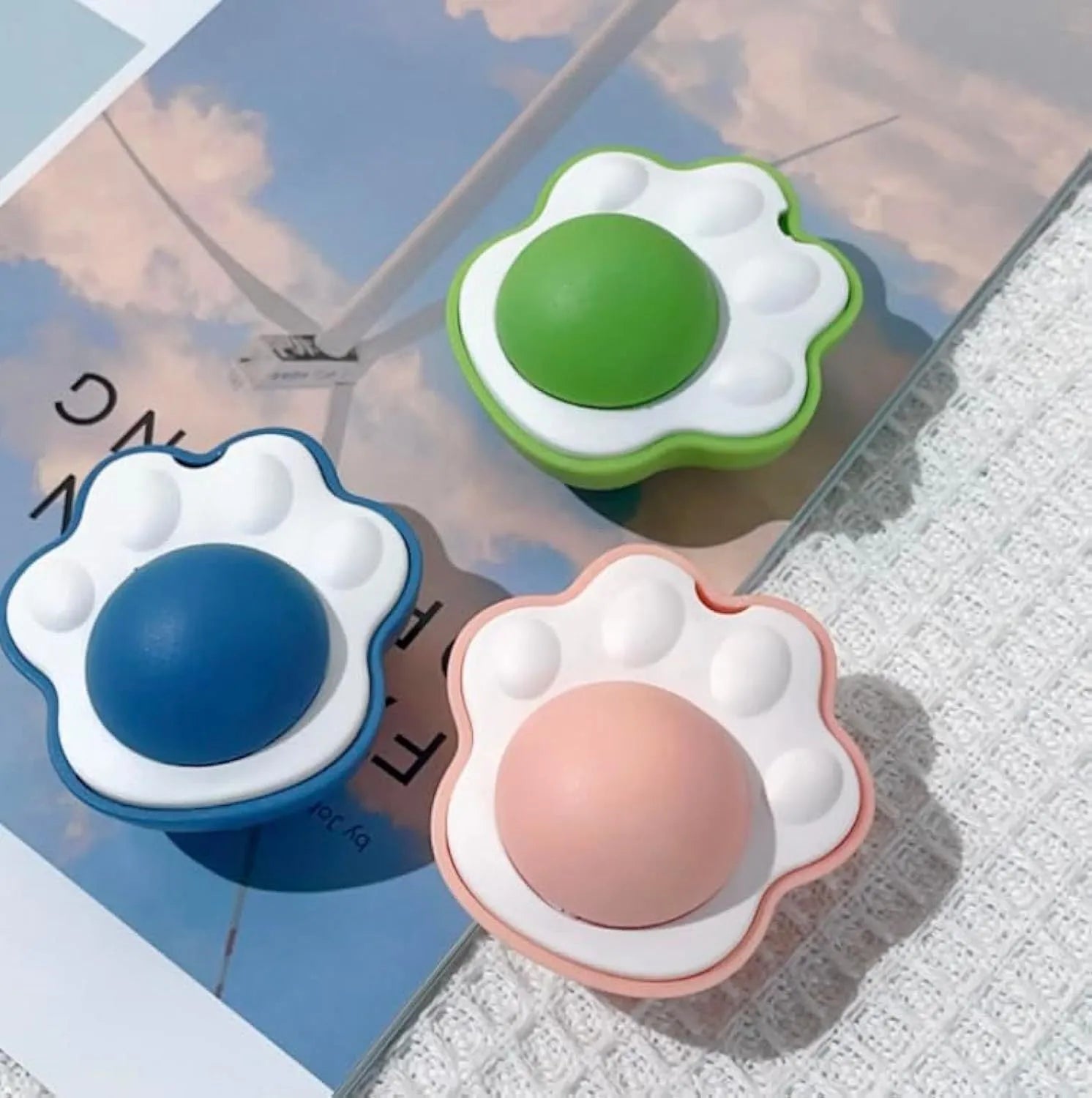 Edible vine catnip balls for cats in blue, green, and pink colours