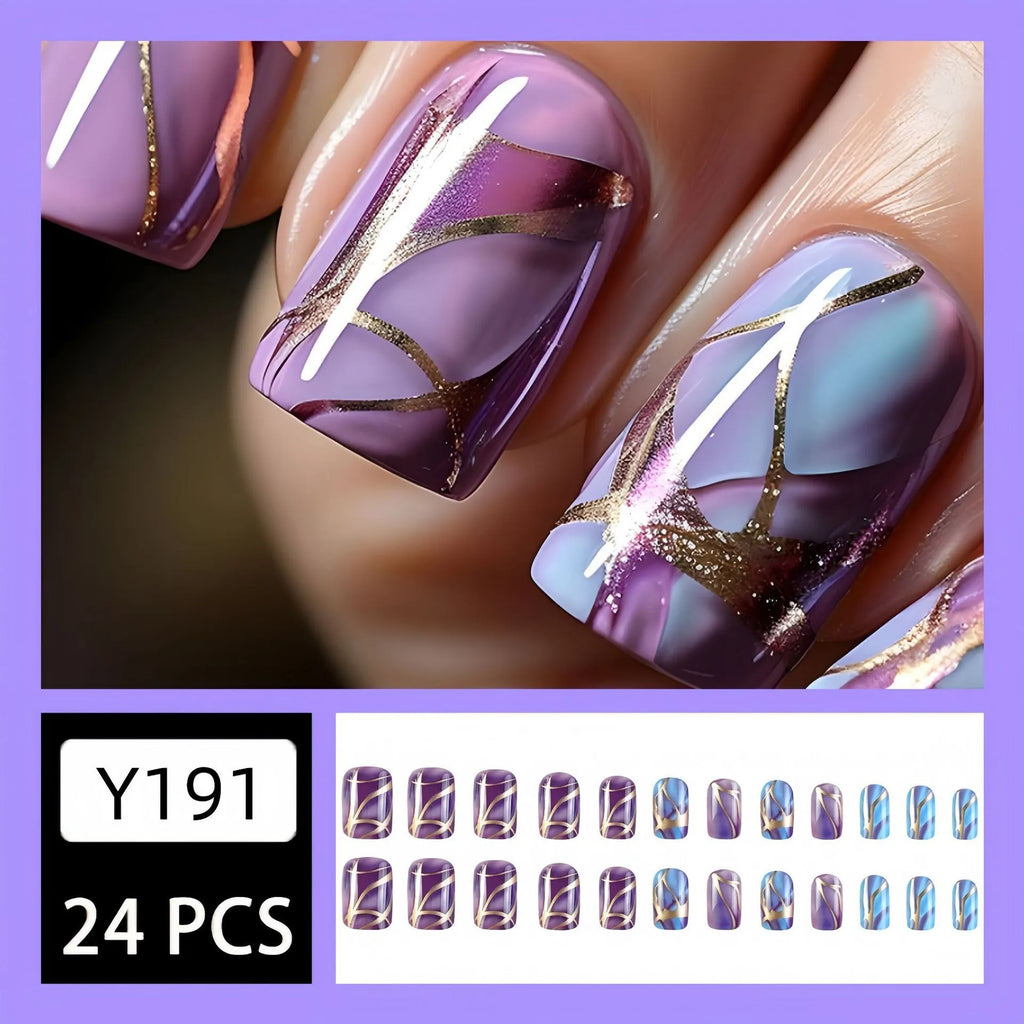 Mid-length purple and white striped nail art stickers on a nail.