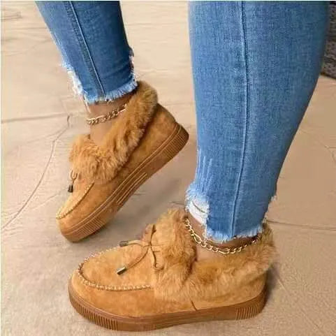 Cotton warm winter slippers with velvet lining and a non-slip rubber sole in a round-toe casual style.