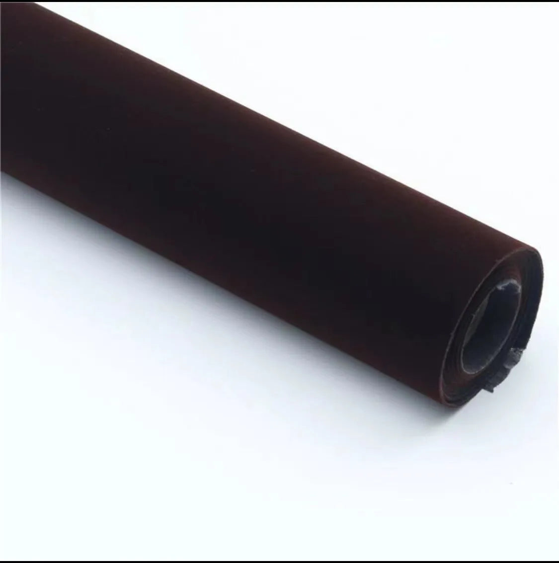 Rolls and sheets of coloured self-adhesive suede leather material for DIY projects.