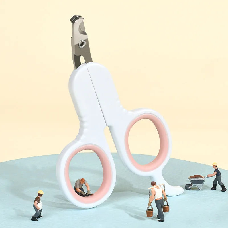 Professional grey pet nail clippers with curved tips and rubber-coated ergonomic handle.