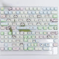 Full set of colourful puppy design PBT plastic key caps for a mechanical keyboard.