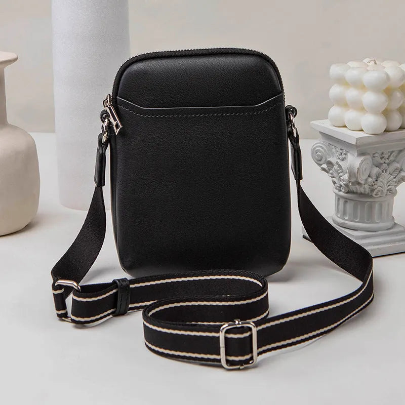 Solid colour PU leather mobile phone crossbody shoulder bag shown in beige.
