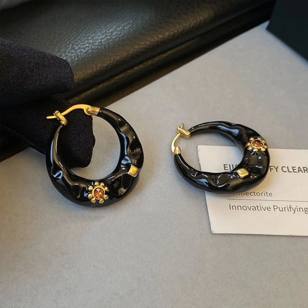 Hong Kong style retro ear studs with rhinestone decoration and dripping oil finish in black and red colour options