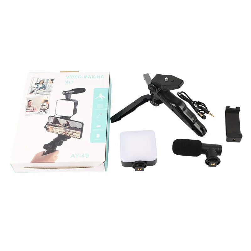 Universal LED mini square camera flash with rotatable head on a tripod stand.