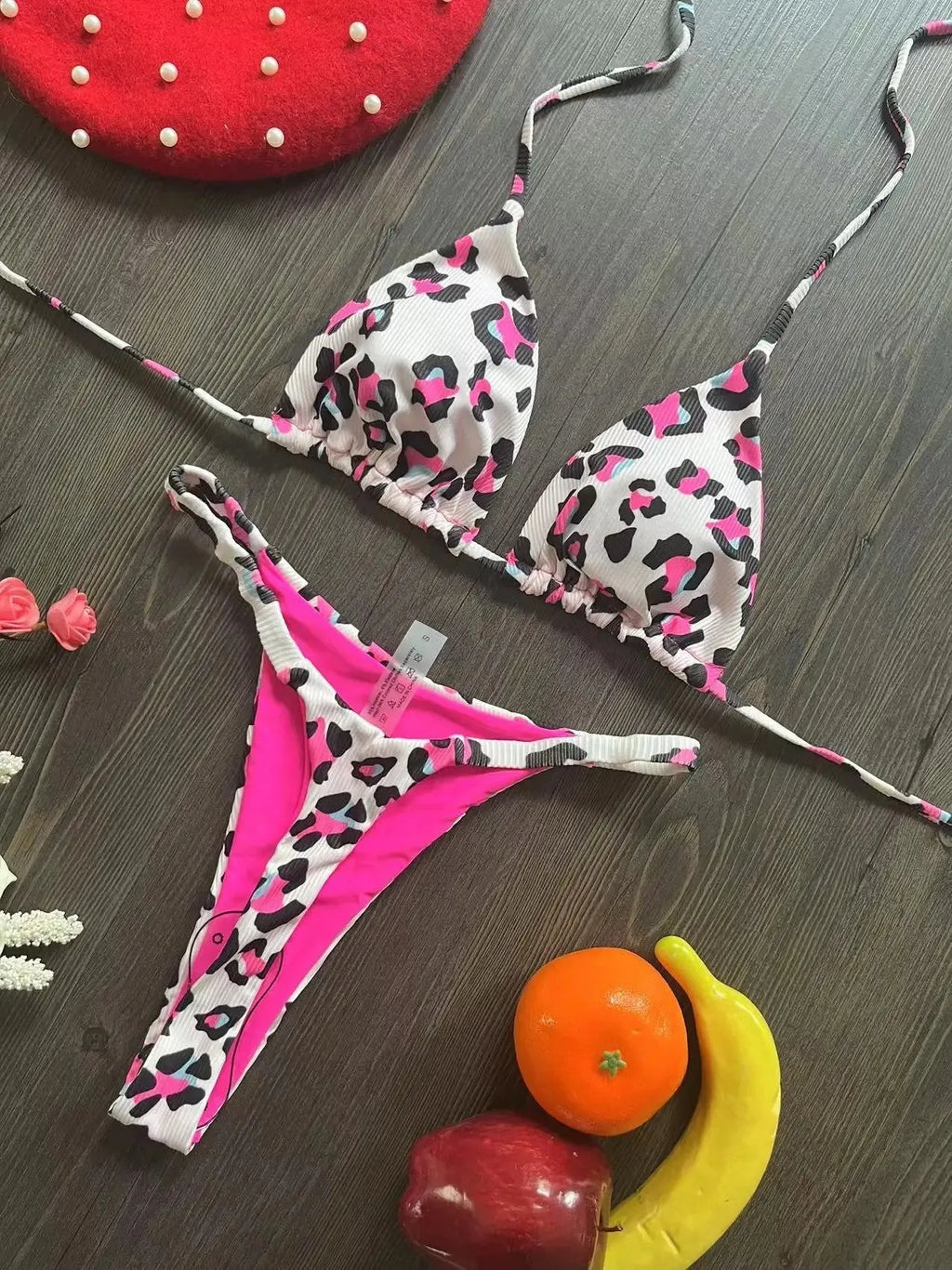 Women's printed bikini swimsuit with briefs style on a neutral background.
