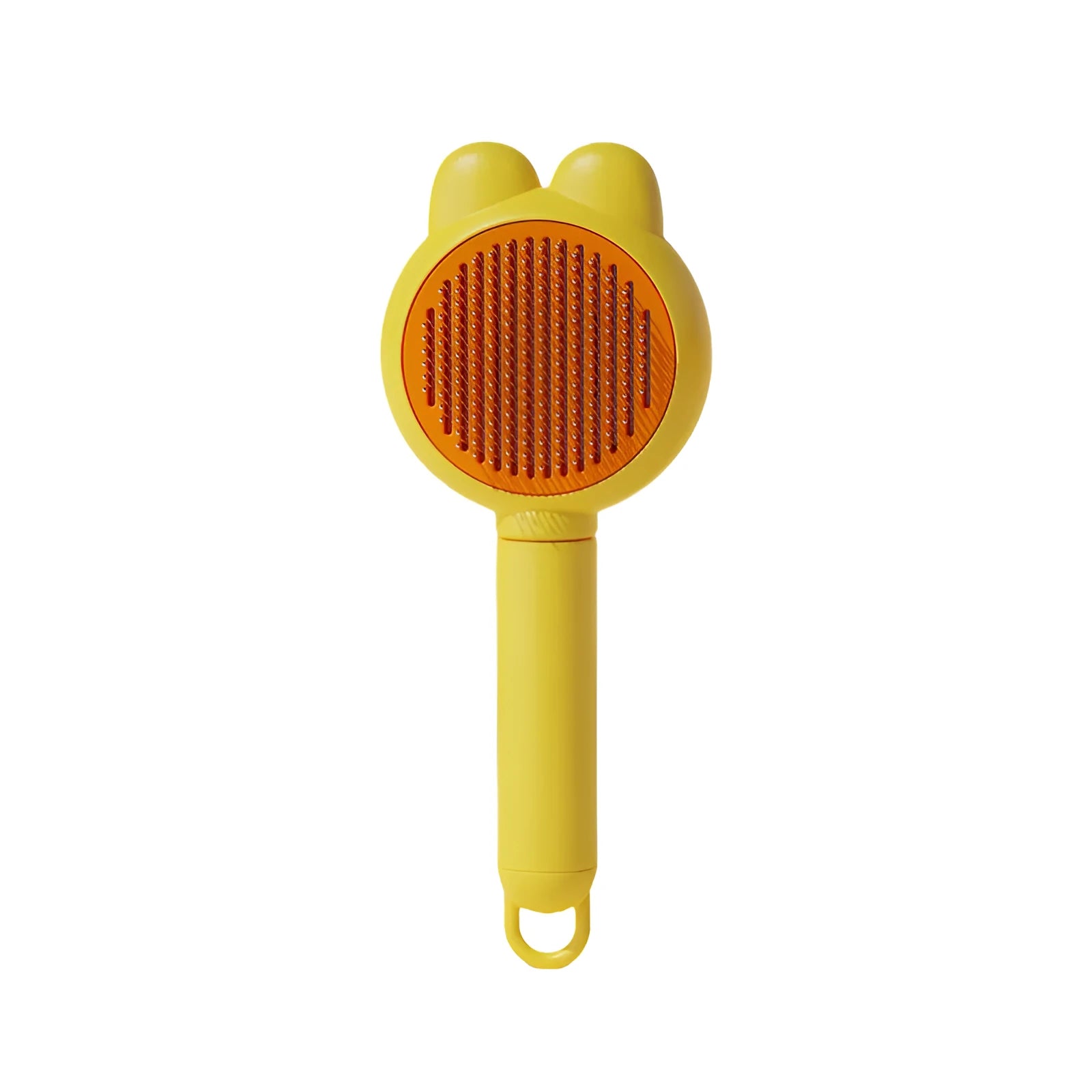 Self-cleaning pet grooming brush with green handle and stainless steel comb, showing the release button.