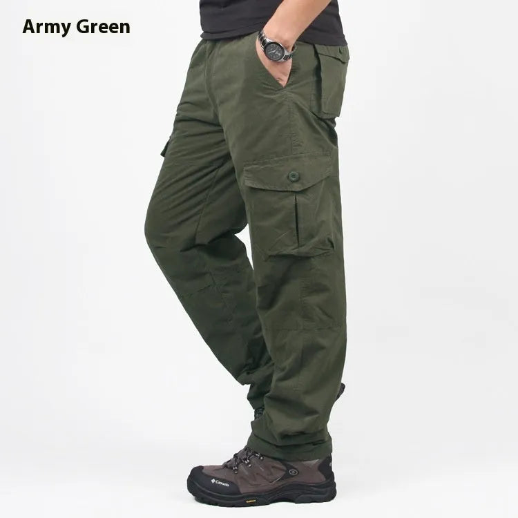 Men's stone-washed cotton overalls with a velvet lining, shown in a loose straight-leg fit.