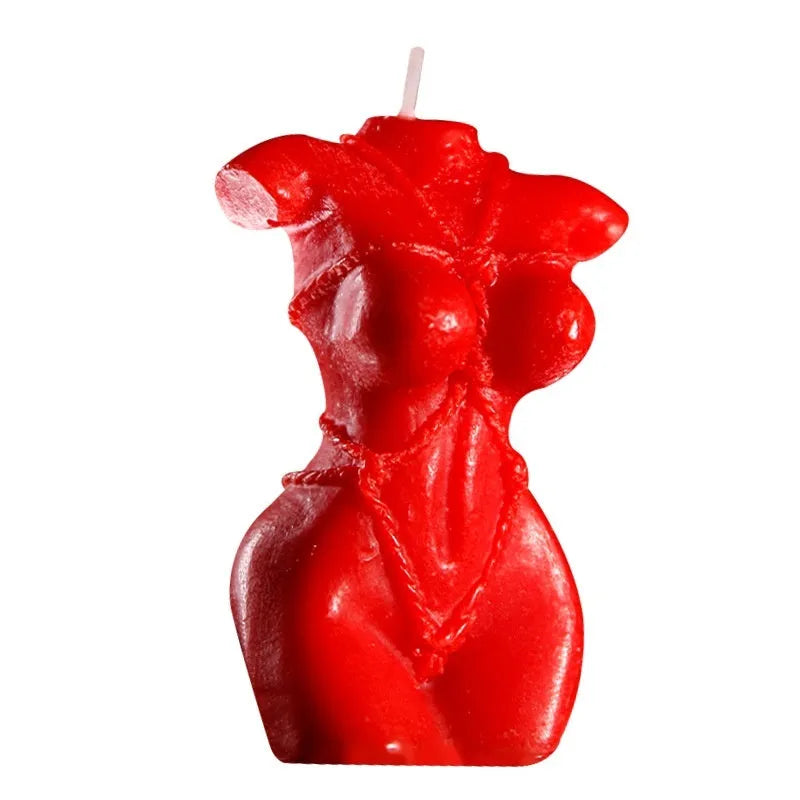 Soy wax low temperature massage candles in red, pink, and purple colours.