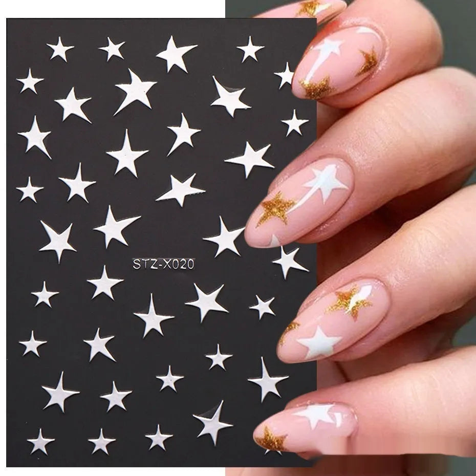 Pack of black and silver striped nail art stickers with cartoon and love pattern designs.