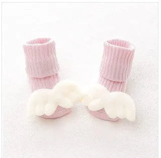 Cotton baby floor socks in various colours and patterns with size guide for ages 0-3 months