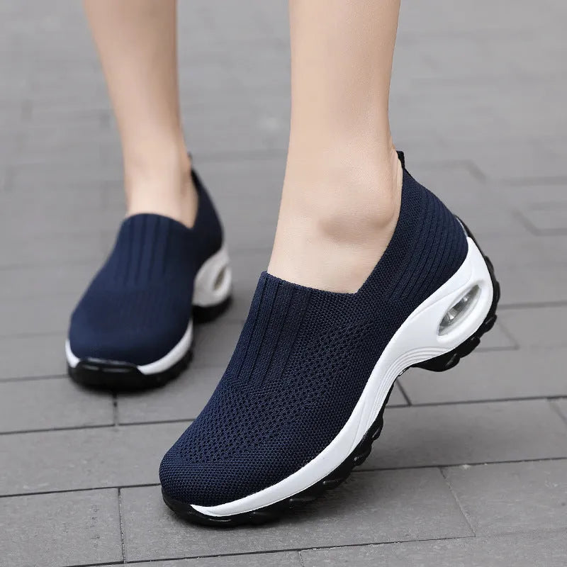 Breathable mesh slip-on sports shoes for women with air cushion sole, round toe, thick bottom, available in light gray