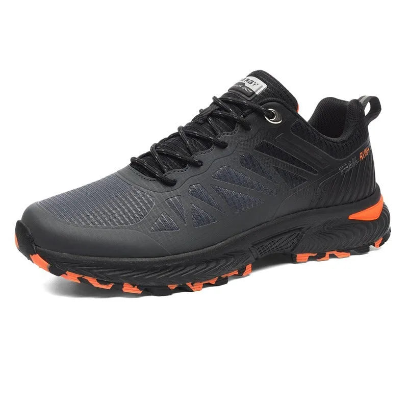 Men's black breathable mesh running shoes with orange accents and a rubber sole
