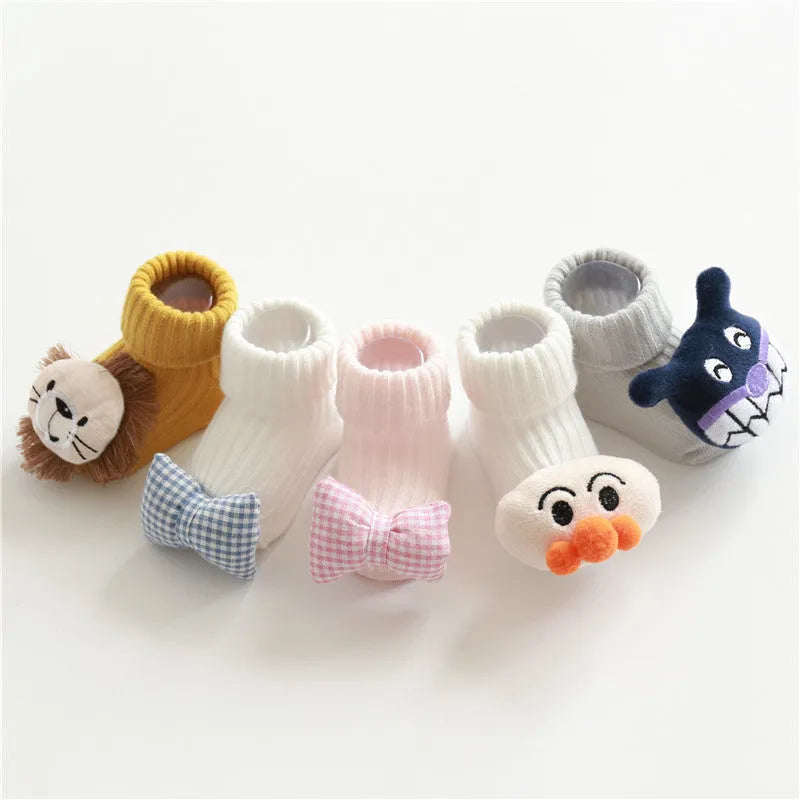 Cotton baby floor socks in various colours and patterns with size guide for ages 0-3 months