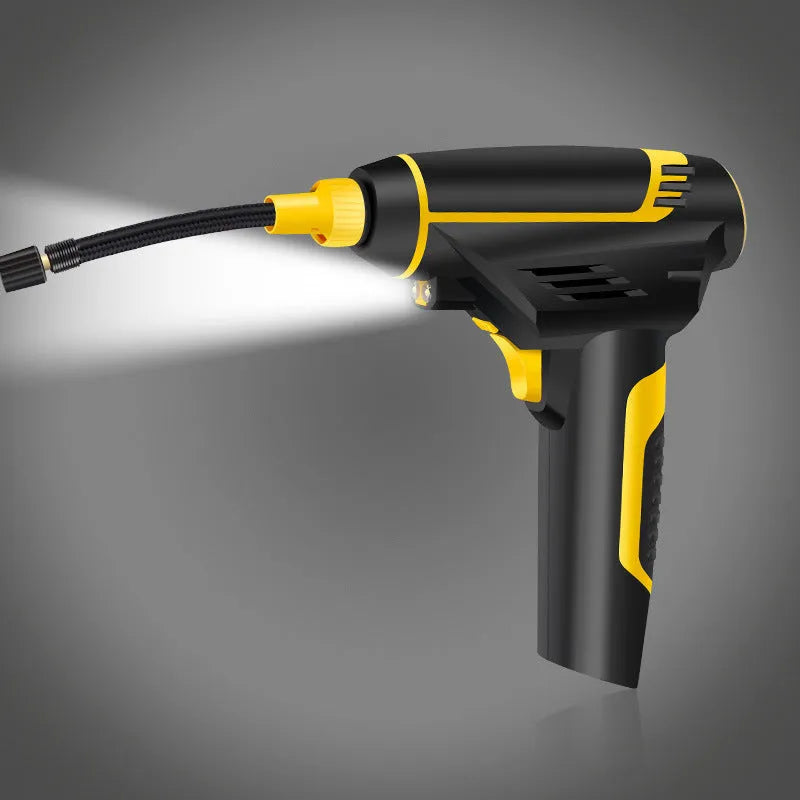 Black handheld digital LED car air compressor with 120W power and auto stop on a dark background