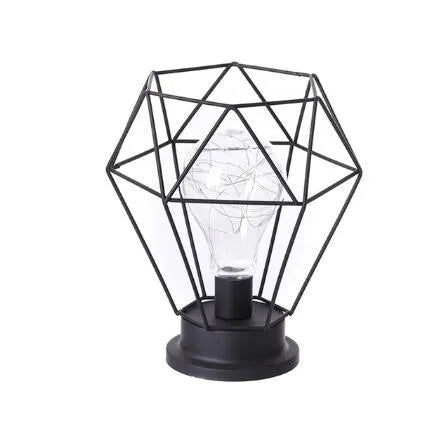 Minimalist hollow iron table lamp in wine glass or bottle design with warm white LED light