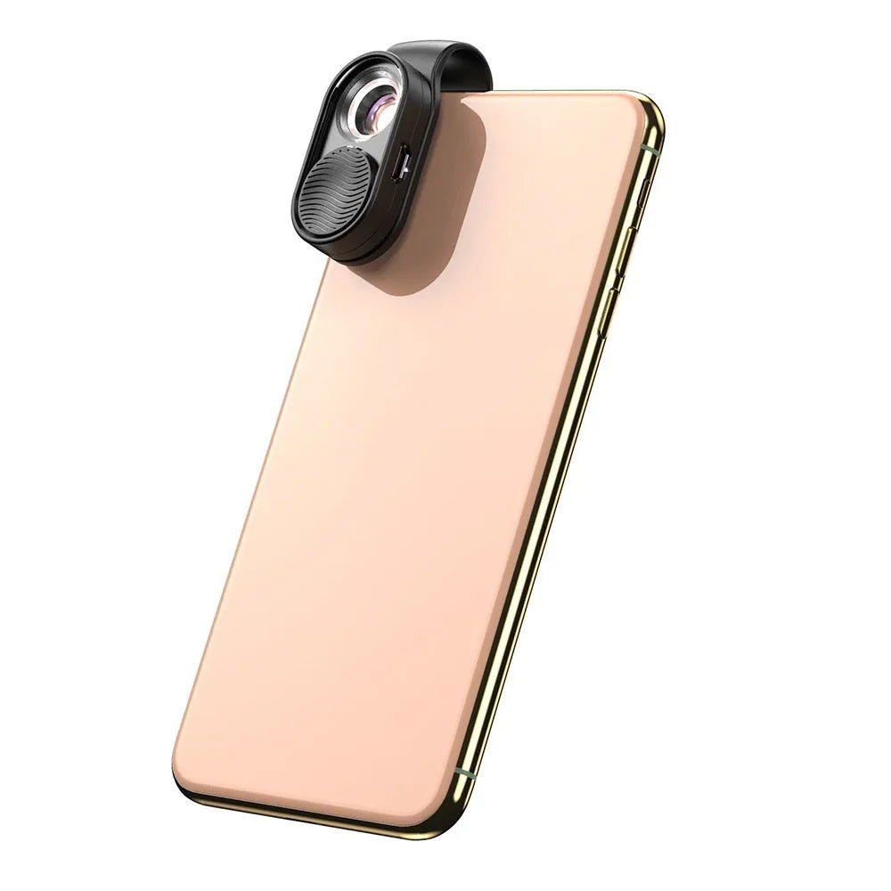 Black mobile magnification microscope clipped to smartphone with six LED lights illuminated, 100x lens, Micro USB charging port visible