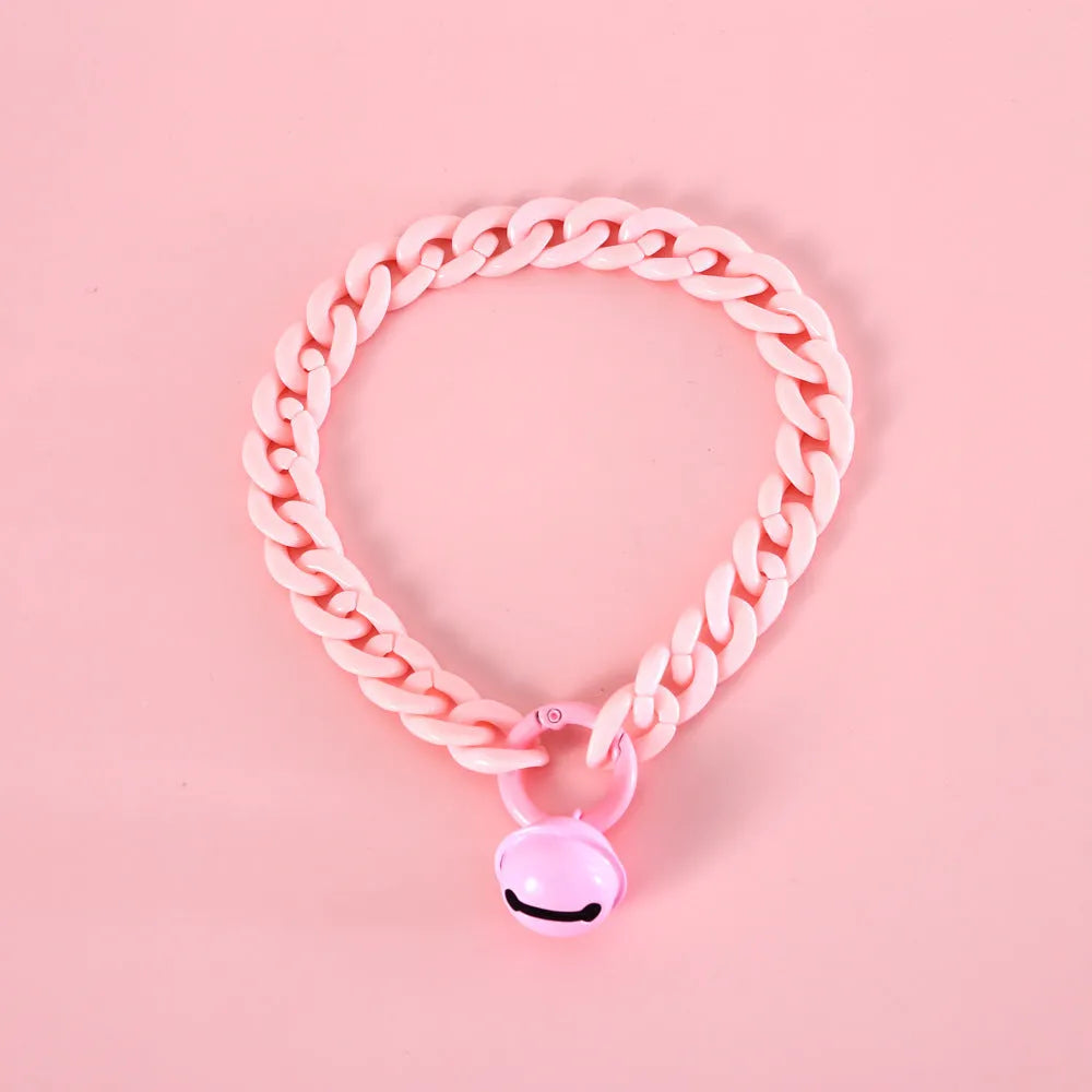Adjustable plastic pet collar in macaron candy colours for cats, dogs, and rabbits.