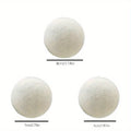 Set of six wool drying balls in three sizes 5cm 7cm 8cm for static reduction and chemical-free fabric softening
