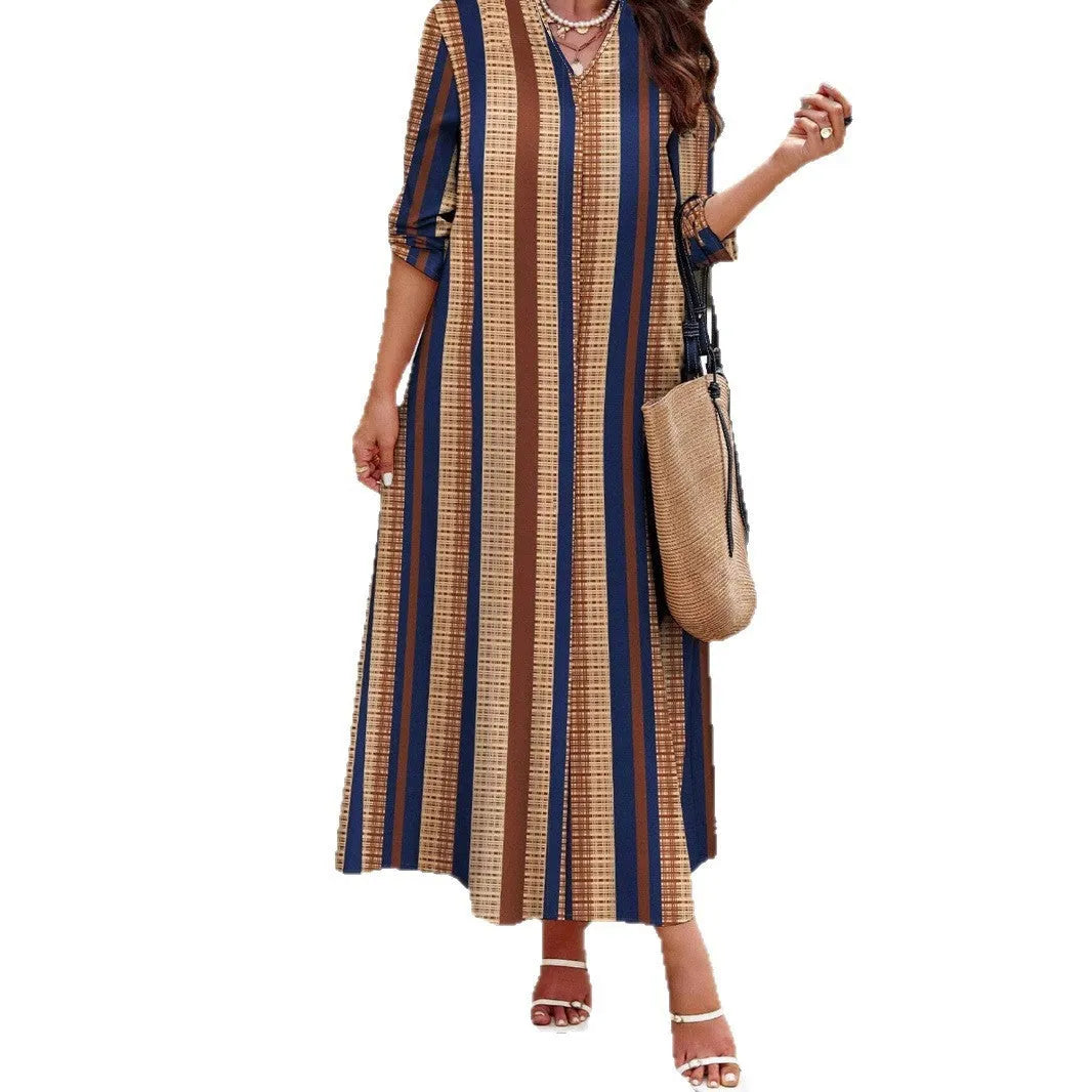 Camel coloured knitted dress with vertical stripes, V-neck collar and long sleeves