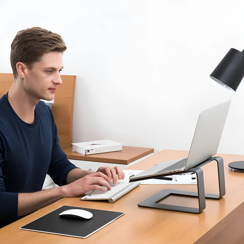 Black aluminium alloy laptop stand measuring 29.9 x 25.8 x 18.5 cm for 13-17 inch notebooks