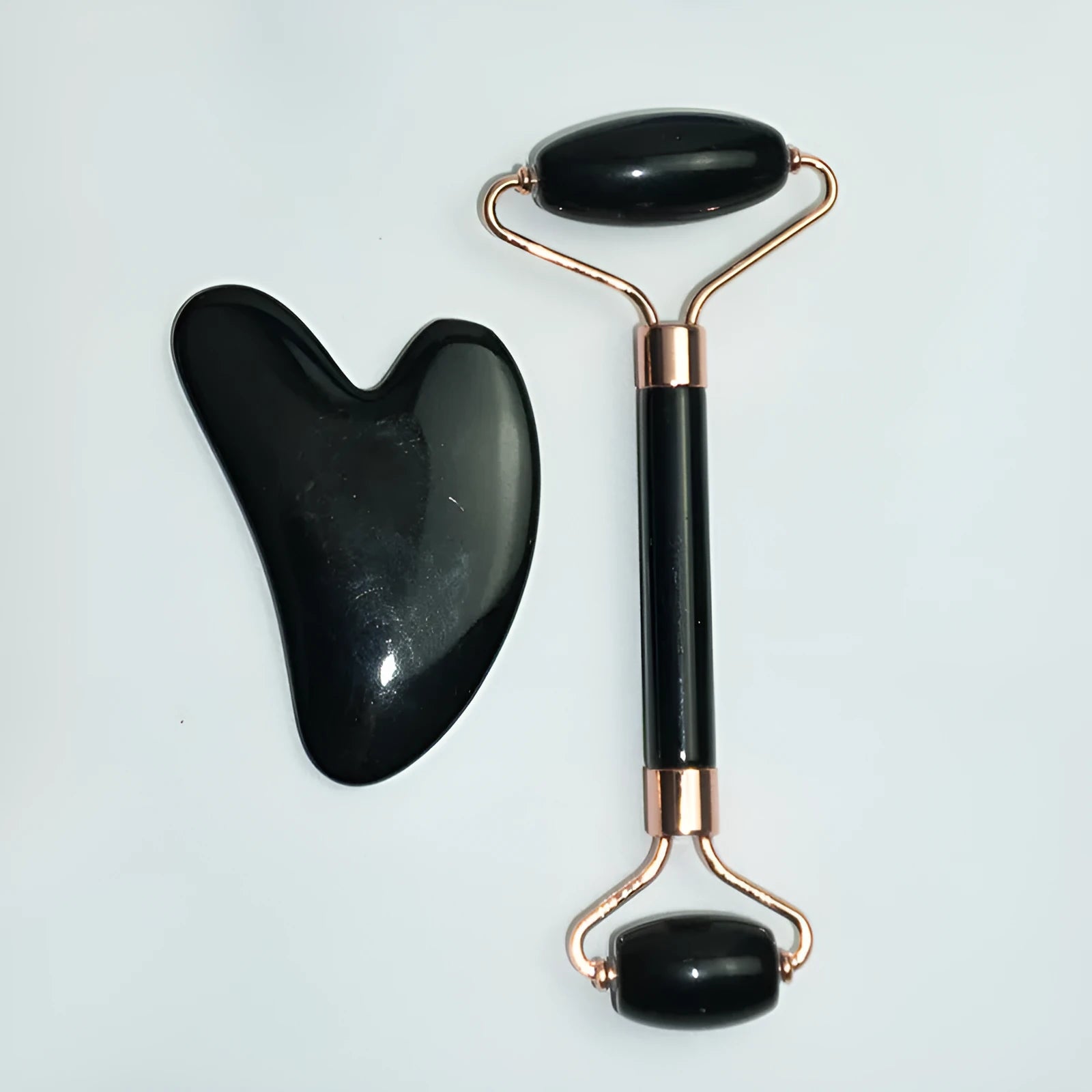 Stainless steel facial massage board set with heart-shaped design and scraping plate