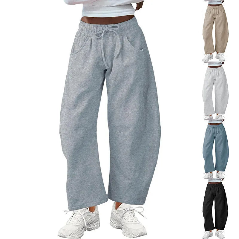 Loose cotton cropped sweatpants with elastic waistband in street fashion style