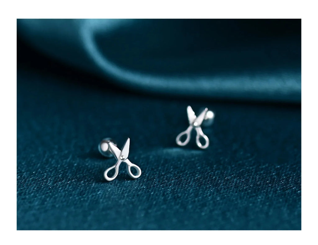 Small silver ear nails with miniature scissors design and screw-back fitting