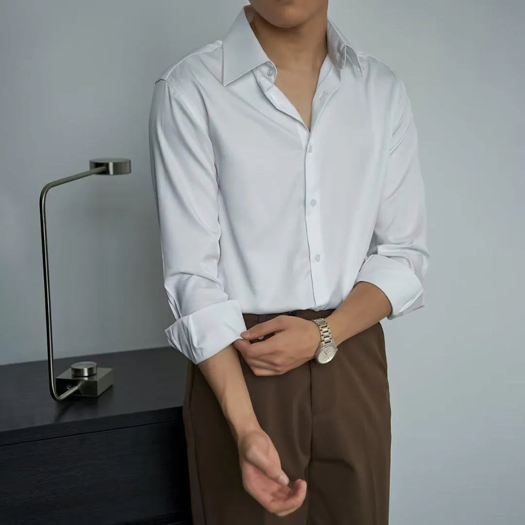 Man wearing a black loose-fit Korean style cardigan shirt with long sleeves and a Japanese retro design.