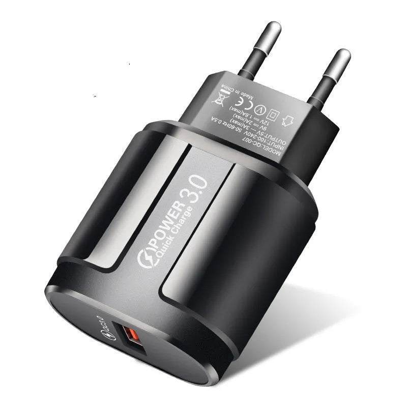 White international smart charger for mobile phones with EU UK US plug options shown