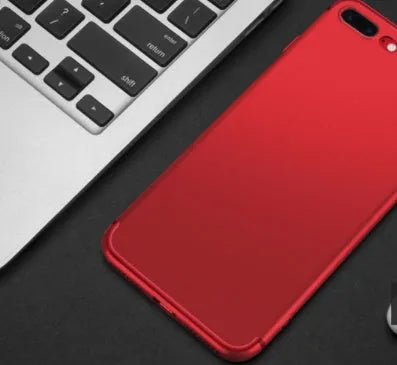 Flexible black silicone protective case for an iPhone, showing the model cutouts.