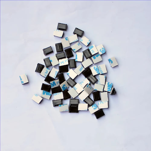 Black PA66 plastic automotive wire retaining clips for cable management in cars.
