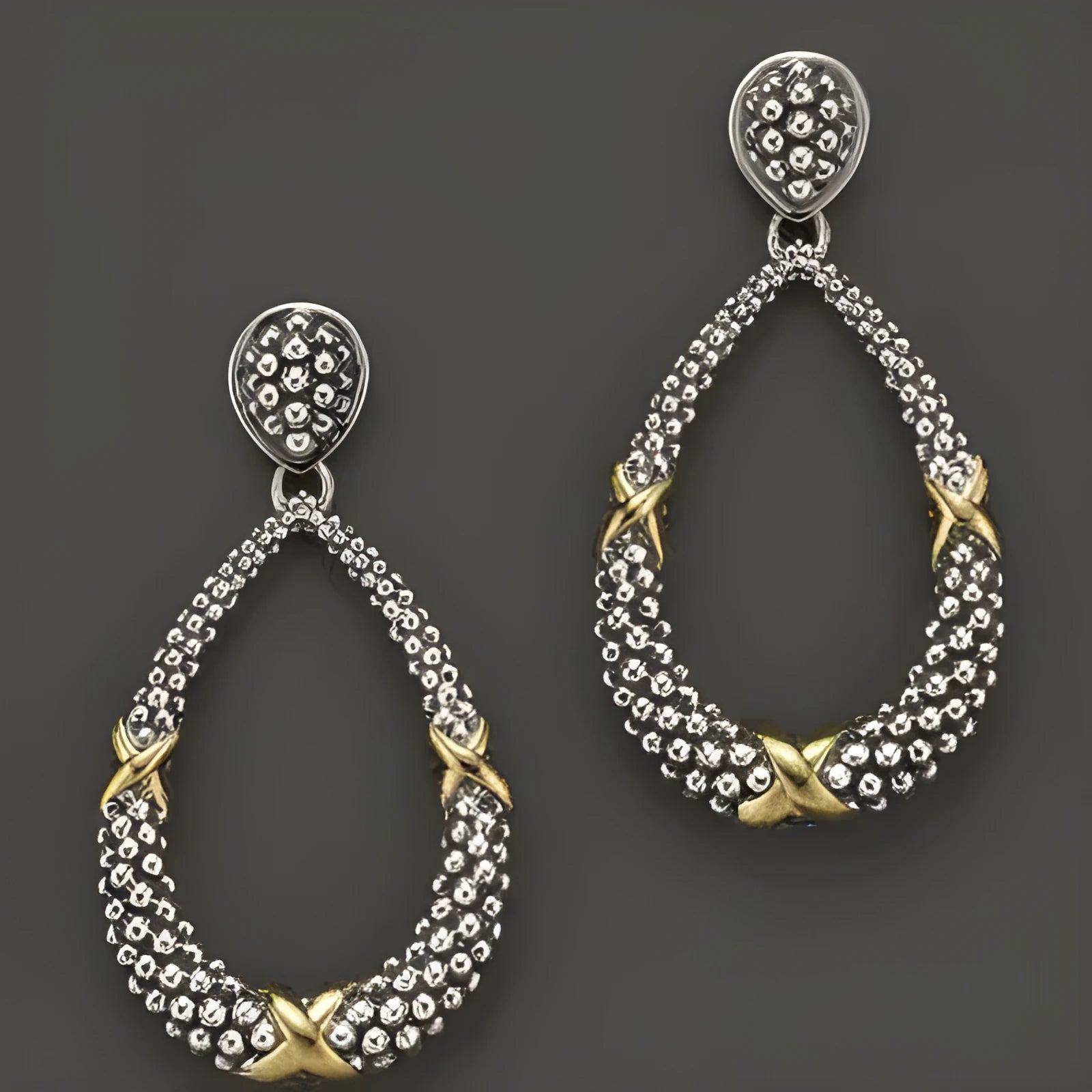 Retro antique silver earrings with animal zodiac motif on silver background