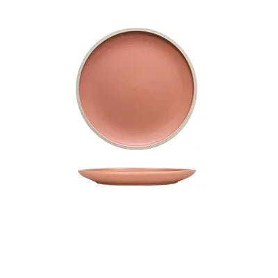Blue matte ceramic dinner plate 10 inches with sesame point glaze on a table