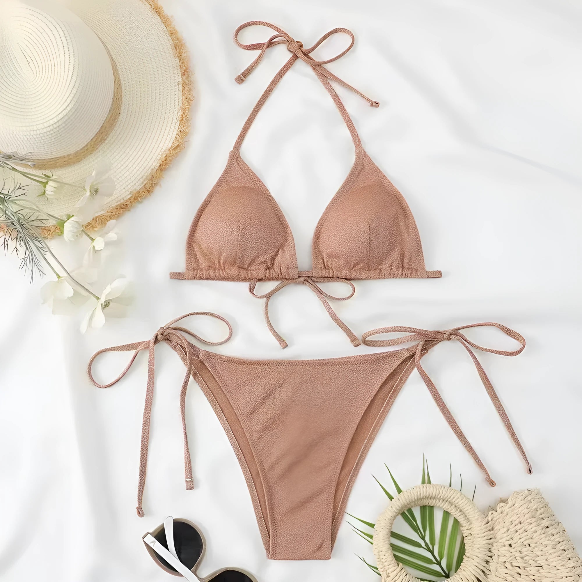 Women's bandage style bikini swimsuit with halter neck top and briefs in polyester fabric