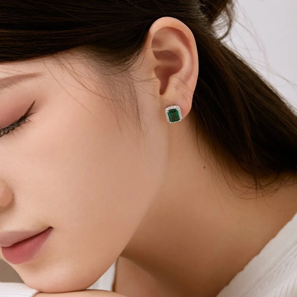 Diamond and emerald symmetry stud earrings in platinum 925 silver 8.5 x 10.5mm